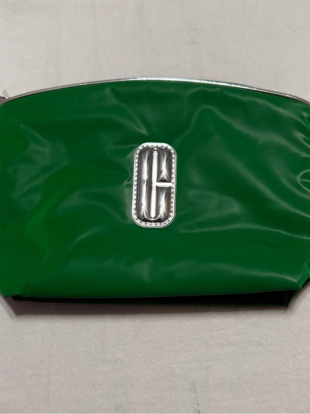 Clinique Emerald Green Cosmetic Case with Silver Emblem